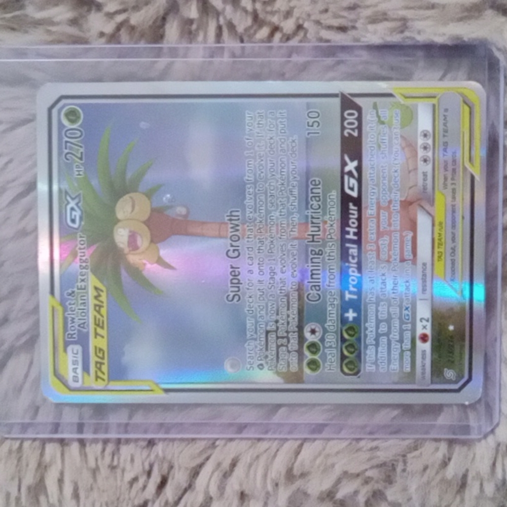 Rowlet & Alolan Exeggutor GX holographic 215/236 near mint